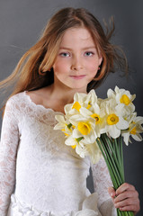 Portrait of the girl with narcissus