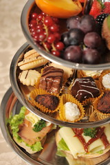 Decorated party setting with gourmet desserts and appetizers