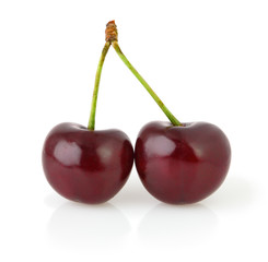 Two sweet cherries isolated on white