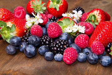 Berries on Wooden Background