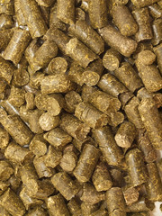 herbs granules background. food for horse and farm animal
