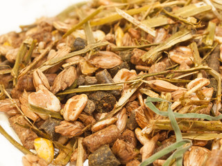 basic muesli  with herbs background for horse . macro