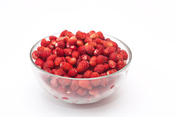 Wild strawberry in glass bowl
