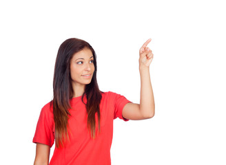 Attractive brunette girl dressed in red pressing something