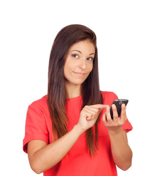 Attractive brunette girl dressed in red with a mobile thinking