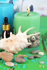 Sea spa composition on wooden table on blue natural background