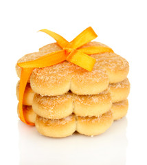 Sweet cookies tied with orange ribbon isolated on white