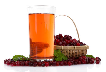 Glass of cranberry juice and ripe red cranberries, isolated
