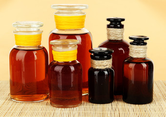 Medicine bottles on beige background