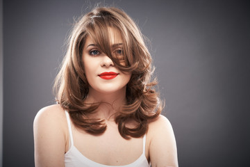 Fototapeta premium Woman portrait with curler hair