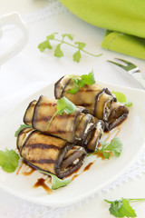 Appetizer of eggplant rolls with..
