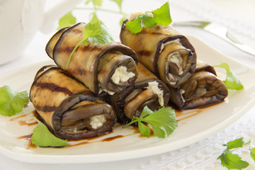 Appetizer of eggplant rolls with..