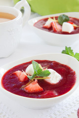 Dessert. Strawberry soup with cream.
