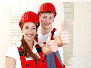 Worker showing thumbs up in site