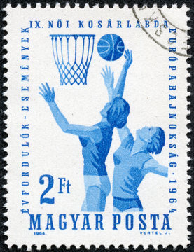 stamp printed in Hungary shows image of netball players