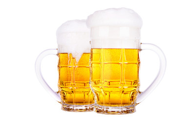 Frosty glass of light beer isolated