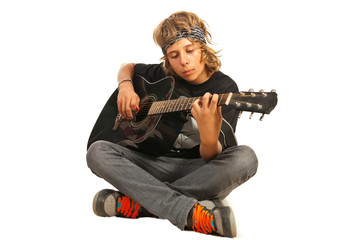 Rocker teen with accoustic guitar