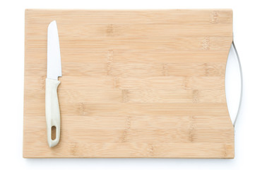 Knife on a wooden chopping board with clipping path
