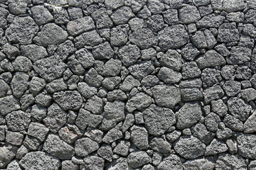 Mauer aus Vulkangestein