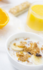 Whole grain cereal and orange juice breakfast