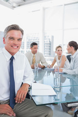 Smiling businessman during a meeting