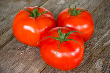 Tomatoes on the old wooden floor