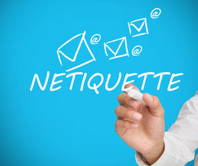 Businessman writing netiquette