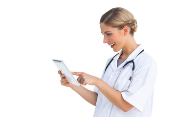 Side view of nurse with tablet pc