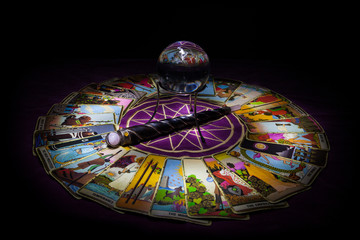 Tarot card reading with crystal ball.