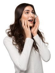 Closeup of a happy young woman surprised