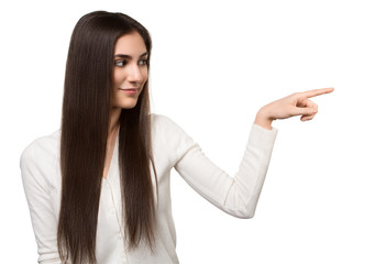 Portrait of attractive businesswoman pointing her finger