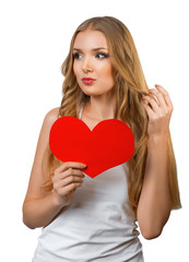 Young beautiful woman holding heart symbol Valentine's Day