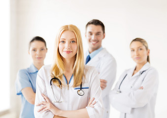 female doctor in front of medical group