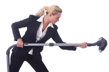 Businesswoman with vacuum cleaner on white