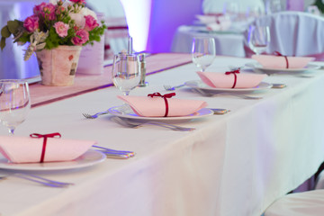 luxury place setting, purple napkin on plate