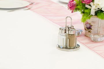 salt cellar and pepper box on the table