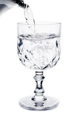 filling a glass with pure water