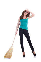 Young woman with broom isolated on white