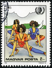 stamp printed in Hungary showing women doing gymnastics