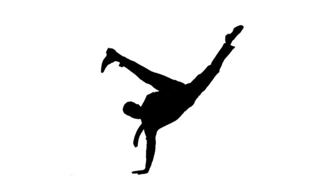 Silhouette of man with a tie breakdancing on white background