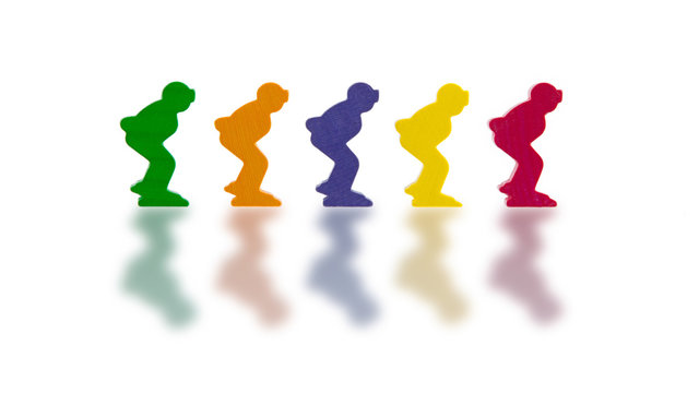 Five colored pawns isolated on a white background