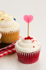 berry cupcake with heart stick