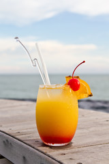 Relax with a mocktail by the beach