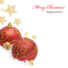 Red Christmas bauble and stars on white background