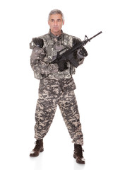Mature Soldier Holding Rifle