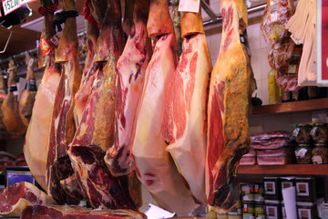 Jamon market in the La Boqueria, Barcelona, Spain.