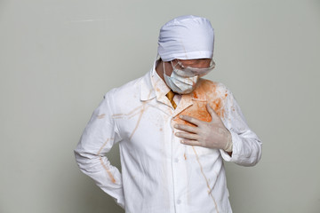 Doctor in a bloody robe