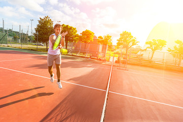 Young Man Playing Tennis