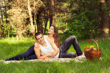 Fototapeta premium beautiful happy couple at picnic