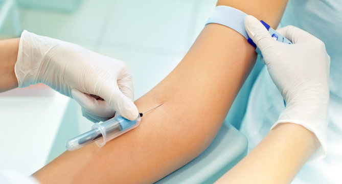 the nurse is going to loosening a tourniquet during the injectio
